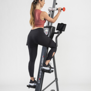 Woman exercising on CrossClimber vertical climber machine